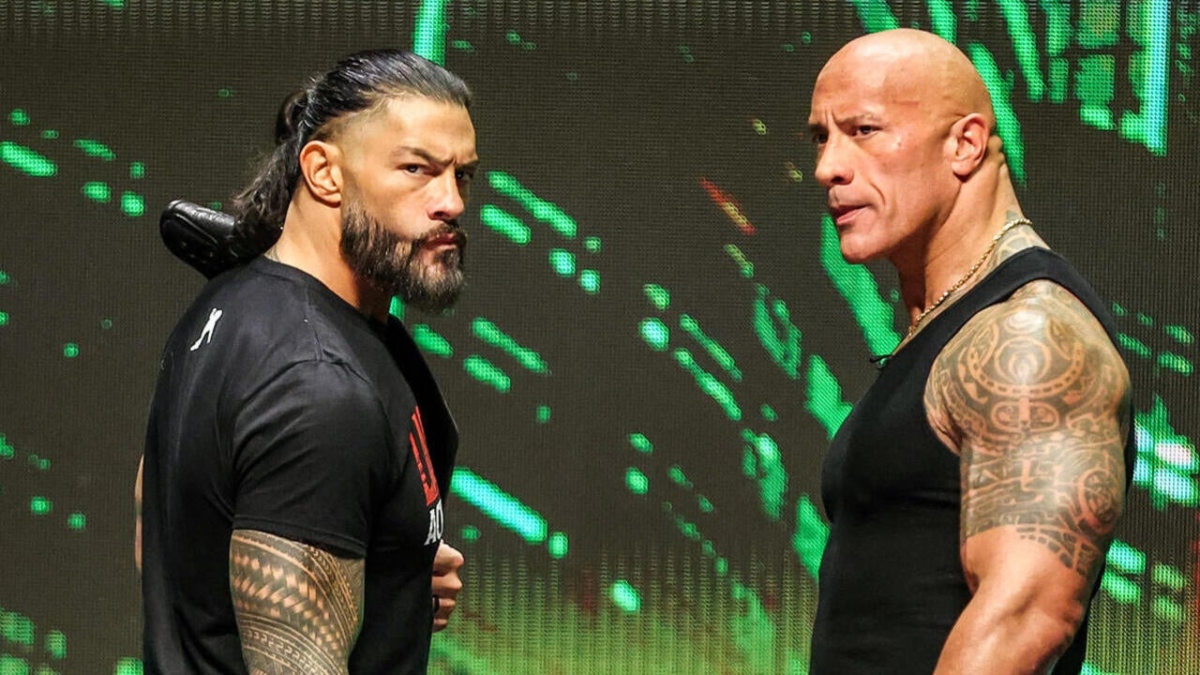 how are roman reigns and the rock related_